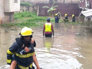Residents being recused from a sinking story building in Lagos State
